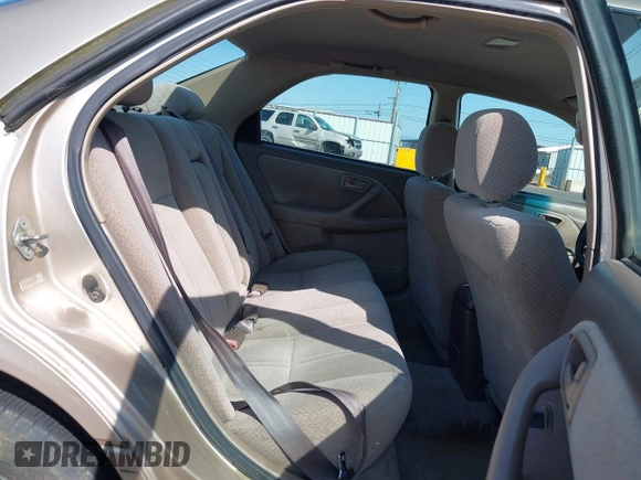 2000 Toyota Camry CE z VIN JT2BG22K2Y0440255, wystawiony jako IAAI lot #42088080 z przebiegiem 353 102 mil mil oraz . Historia ofert i sprzedaży dostępna na DreamBid. Obrazek 8.