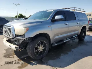 2010 Toyota Tundra Limited with VIN 5TFHW5F11AX140890, listed as a Copart auction lot 61458735 with 246,754 mi miles and Salvage title. Bid and sale history available at DreamBid. Image 1.