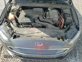 2017 Ford Fusion Hybrid SE z VIN 3FA6P0LU3HR307488, wystawiony jako Copart lot #81685685 z przebiegiem 111 306 mil mil oraz Szkoda całkowita • Salvage title. Historia ofert i sprzedaży dostępna na DreamBid. Obrazek 13.