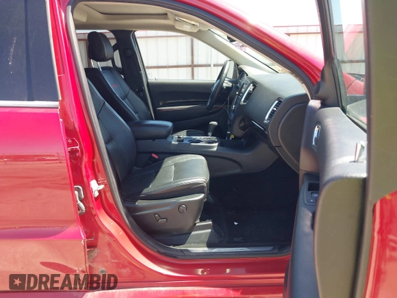 2013 Dodge Durango R/T with VIN 1C4SDJCTXDC697240, listed as a IAAI auction lot 42209558 with 130,735 mi miles and . Bid and sale history available at DreamBid. Image 5.