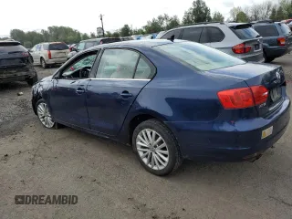 2013 Volkswagen Jetta TDI w/Premium with VIN 3VWLL7AJ6DM386508, listed as a Copart auction lot 57067455 with 127,573 mi miles and Salvage title. Bid and sale history available at DreamBid. Image 2.