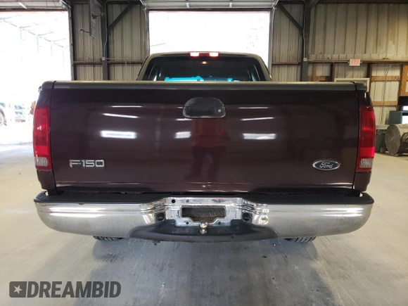 2000 Ford F-150 XL with VIN 1FTZX1726YKB41994, listed as a Copart auction lot 69300034 with Not provided miles and Salvage title. Bid and sale history available at DreamBid. Image 6.