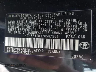 2007 Toyota Camry CE z VIN 4T1BE46KX7U587204, wystawiony jako IAAI lot #41923778 z przebiegiem 144 996 mil mil oraz . Historia ofert i sprzedaży dostępna na DreamBid. Obrazek 9.