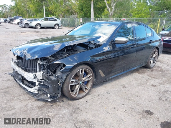 2019 BMW 5 Series M550i xDrive with VIN WBAJB9C51KB289355, listed as a IAAI auction lot 41867984 with 30,106 mi miles and . Bid and sale history available at DreamBid. Image 17.
