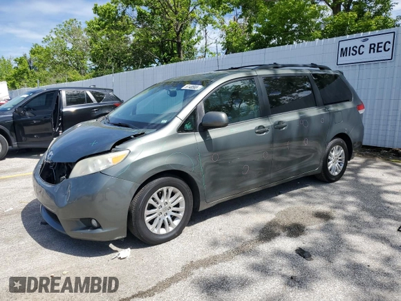 2014 Toyota Sienna XLE with VIN 5TDYK3DC1ES453924, listed as a Copart auction lot 56148565 with 198,185 mi miles and Clean title. Bid and sale history available at DreamBid. Image 1.