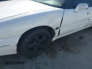 1999 Pontiac Bonneville SE z VIN 1G2HX52KXXH254051, wystawiony jako IAAI lot #41990245 z przebiegiem 213 000 mil mil oraz . Historia ofert i sprzedaży dostępna na DreamBid. Obrazek 6.