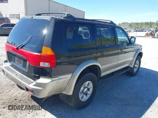 1999 Mitsubishi Montero Sport LS with VIN JA4LS31H7XP018312, listed as a IAAI auction lot 41827943 with 204,814 mi miles. Bid and sale history available at carsss.com. Image 4.