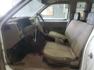1988 Nissan Hardbody E z VIN 1N6ND16Y3JC351348, wystawiony jako Copart lot #80864914 z przebiegiem 184 397 mil mil oraz Szkody całkowita. Historia ofert i sprzedaży dostępna na DreamBid. Obrazek 7.