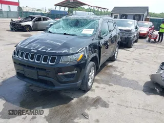 2018 Jeep Compass Sport z VIN 3C4NJDAB3JT245518, wystawiony jako IAAI lot #42094119 z przebiegiem 96 915 mil mil oraz . Historia ofert i sprzedaży dostępna na DreamBid. Obrazek 2.