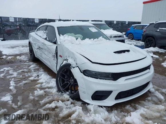 2022 Dodge Charger Scat Pack Widebody with VIN 2C3CDXGJ4NH183094, listed as a IAAI auction lot 41300119 with 31,800 mi miles and . Bid and sale history available at carsss.com. Image 1.