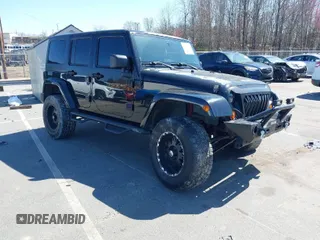 2008 Jeep Wrangler Unlimited Sahara with VIN 1J4GB591X8L625463, listed as a IAAI auction lot 41771302 with 211,567 mi miles and . Bid and sale history available at DreamBid. Image 1.