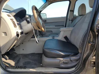 2011 Ford Escape Hybrid with VIN 1FMCU4K35BKA16469, listed as a Copart auction lot 65811905 with 401,583 mi miles and Clean title. Bid and sale history available at DreamBid. Image 7.