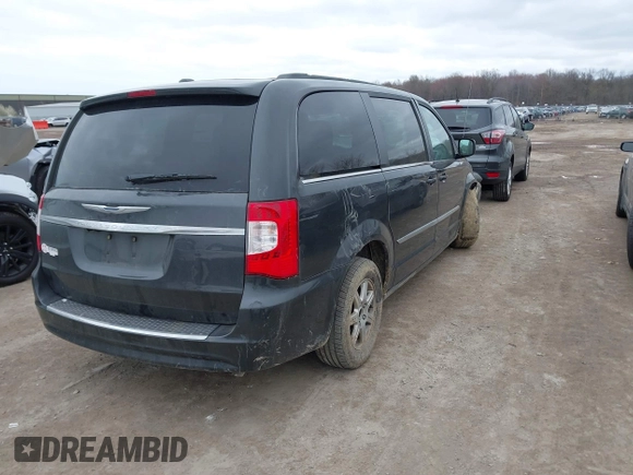 2011 Chrysler Town & Country Touring with VIN 2A4RR5DG0BR781302, listed as a IAAI auction lot 42049909 with 1 mi miles. Bid and sale history available at carsss.com. Image 4.