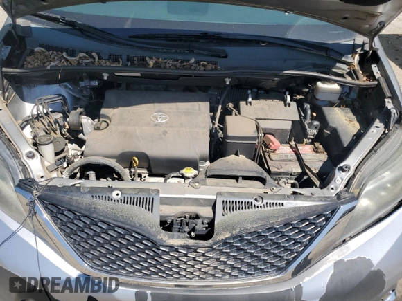 2012 Toyota Sienna SE with VIN 5TDXK3DC7CS239254, listed as a Copart auction lot 53244725 with 134,669 mi miles and Clean Title. Bid and sale history available at carsss.com. Image 12.