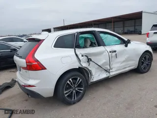 2021 Volvo XC60 Momentum with VIN YV4102DK6M1827283, listed as a IAAI auction lot 41388004 with 38,991 mi miles. Bid and sale history available at carsss.com. Image 4.
