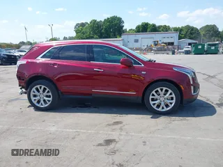 2017 Cadillac XT5 Luxury FWD z VIN 1GYKNBRS3HZ293677, wystawiony jako IAAI lot #42043025 z przebiegiem 89 975 mil mil oraz . Historia ofert i sprzedaży dostępna na DreamBid. Obrazek 13.