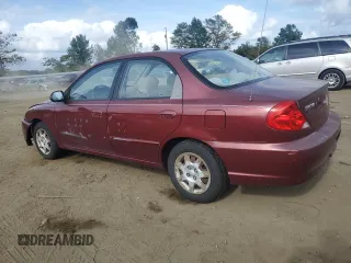 2003 Kia Spectra with VIN KNAFB121935241589, listed as a Copart auction lot 71933194 with 61,738 mi miles and Salvage Title. Bid and sale history available at DreamBid. Image 2.