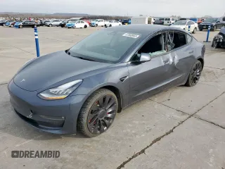 2021 Tesla Model 3 Performance with VIN 5YJ3E1EC5MF850673, listed as a Copart auction lot 47560665 with 96,950 mi miles and Salvage Title. Bid and sale history available at DreamBid. Image 1.