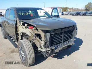 2023 GMC Canyon 4WD AT4 with VIN 1GTP6DEK1P1174713, listed as a IAAI auction lot 41733242 with 35,705 mi miles. Bid and sale history available at carsss.com. Image 6.