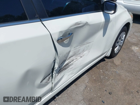 2015 Nissan Altima S with VIN 1N4AL3AP9FC572240, listed as a IAAI auction lot 42137686 with 164,611 mi miles and . Bid and sale history available at DreamBid. Image 13.