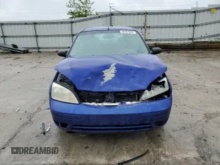 2005 Ford Focus S with VIN 3FAFP37N35R156460, listed as a Copart auction lot 58781635 with 231,066 mi miles and Salvage title. Bid and sale history available at DreamBid. Image 5.