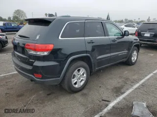 2014 Jeep Grand Cherokee Laredo with VIN 1C4RJEAG6EC359646, listed as a Copart auction lot 57081474 with 110,401 mi miles and Salvage Title. Bid and sale history available at carsss.com. Image 3.