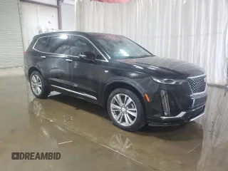 2023 Cadillac XT6 AWD Premium Luxury z VIN 1GYKPDRS6PZ129957, wystawiony jako Copart lot #58808245 z przebiegiem Nie podano mil oraz Czysty tytuł • Clean title. Historia ofert i sprzedaży dostępna na DreamBid. Obrazek 4.