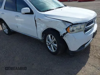 2013 Dodge Durango Crew with VIN 1C4SDHDT2DC679600, listed as a IAAI auction lot 42215737 with 128,499 mi miles and . Bid and sale history available at DreamBid. Image 6.