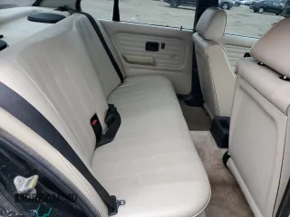 1986 BMW 3 Series 325e z VIN WBAAE640XG1705697, wystawiony jako Copart lot #74269484 z przebiegiem 168 488 mil mil oraz Szkoda całkowita • Salvage title. Historia ofert i sprzedaży dostępna na DreamBid. Obrazek 10.