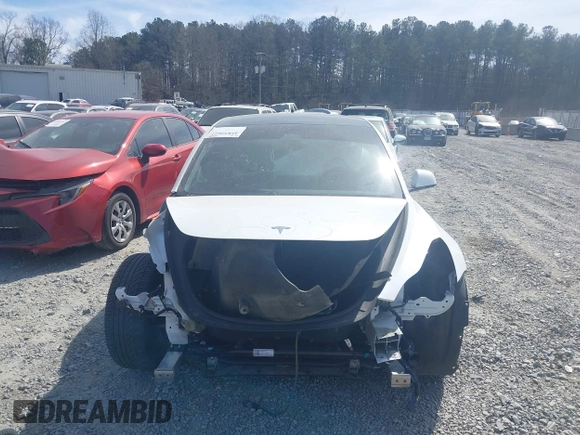 2022 Tesla Model 3 Long Range with VIN 5YJ3E1EB0NF106570, listed as a IAAI auction lot 41832622 with 52,679 mi miles and . Bid and sale history available at DreamBid. Image 12.