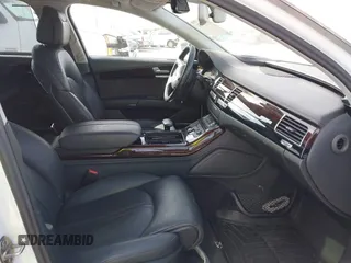 2015 Audi A8 L 4.0T with VIN WAU32AFD4FN002639, listed as a IAAI auction lot 41703951 with 103,722 mi miles. Bid and sale history available at carsss.com. Image 5.