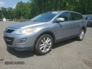 2011 Mazda CX-9 Grand Touring z VIN JM3TB3DV1B0321506, wystawiony jako Copart lot #59611155 z przebiegiem 216 761 mil mil oraz Szkoda całkowita • Salvage title. Historia ofert i sprzedaży dostępna na DreamBid. Obrazek 1.