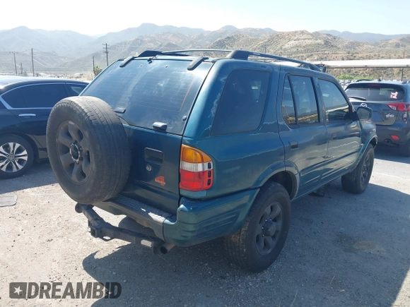 1998 Isuzu Rodeo S z VIN 4S2CM58W8W4328196, wystawiony jako IAAI lot #42323556 z przebiegiem 272 915 mil mil oraz . Historia ofert i sprzedaży dostępna na DreamBid. Obrazek 4.