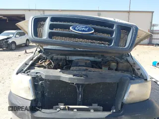 2005 Ford F-150 XLT with VIN 1FTPX14505NA67097, listed as a IAAI auction lot 42012449 with 192,258 mi miles. Bid and sale history available at carsss.com. Image 10.
