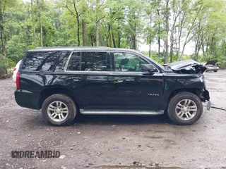 2015 Chevrolet Tahoe LT with VIN 1GNSCBKC9FR600997, listed as a IAAI auction lot 42383789 with 161,151 mi miles and . Bid and sale history available at DreamBid. Image 14.