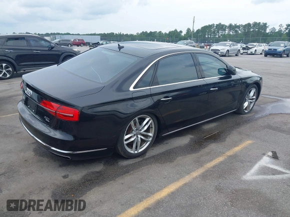 2015 Audi A8 4.0T z VIN WAU32AFD9FN023826, wystawiony jako IAAI lot #42353372 z przebiegiem 94 833 mil mil oraz . Historia ofert i sprzedaży dostępna na DreamBid. Obrazek 4.
