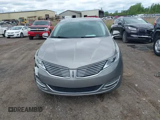 2015 Lincoln MKZ z VIN 3LN6L2J99FR604385, wystawiony jako IAAI lot #42332078 z przebiegiem 116 862 mil mil oraz . Historia ofert i sprzedaży dostępna na DreamBid. Obrazek 12.