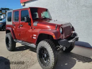 2010 Jeep Wrangler Unlimited Sahara with VIN 1J4BA5H10AL117474, listed as a IAAI auction lot 41969202 with 131,256 mi miles. Bid and sale history available at carsss.com. Image 1.