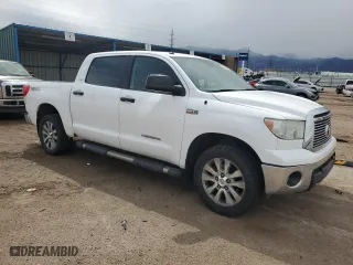 2012 Toyota Tundra 4WD Truck with VIN 5TFDY5F17CX252265, listed as a Copart auction lot 51209395 with 111,183 mi miles and Salvage Title. Bid and sale history available at carsss.com. Image 4.