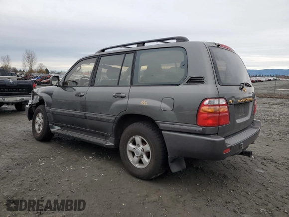 2000 Toyota Land Cruiser with VIN JT3HT05J5Y0114569, listed as a Copart auction lot 86542484 with 256,816 mi miles and Salvage Title. Bid and sale history available at carsss.com. Image 2.
