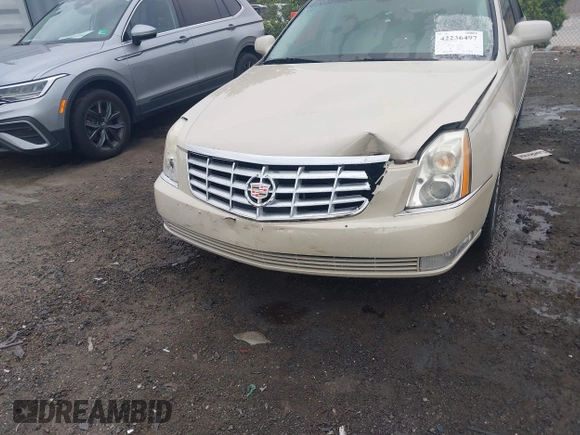 2011 Cadillac DTS z VIN 1G6KA5E65BU139507, wystawiony jako IAAI lot #42236497 z przebiegiem 118 332 mil mil oraz . Historia ofert i sprzedaży dostępna na DreamBid. Obrazek 6.