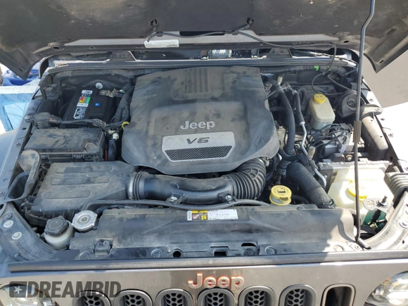 2016 Jeep Wrangler Unlimited Sahara with VIN 1C4BJWEG6GL212733, listed as a Copart auction lot 62664445 with 114,004 mi miles and Salvage title. Bid and sale history available at DreamBid. Image 12.