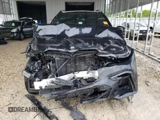 2020 BMW X7 M50i z VIN 5UXCX6C06LLE35455, wystawiony jako Copart lot #54965075 z przebiegiem Nie podano mil oraz Szkoda całkowita • Salvage title. Historia ofert i sprzedaży dostępna na DreamBid. Obrazek 5.