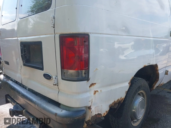 2004 Ford Econoline Cargo with VIN 1FTNE24L94HB46878, listed as a IAAI auction lot 42223765 with 261,454 mi miles and . Bid and sale history available at DreamBid. Image 12.