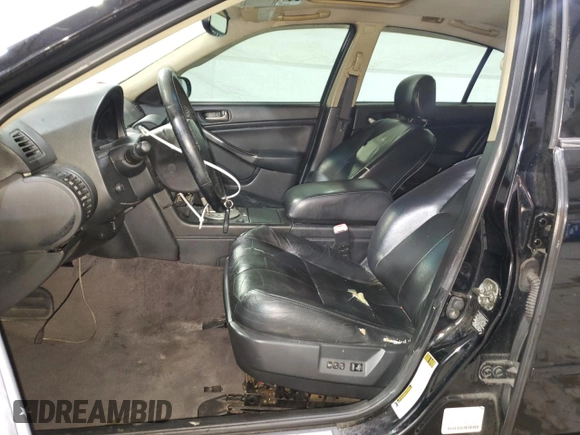 2004 Infiniti G35 w/Leather with VIN JNKCV51FX4M703729, listed as a Copart auction lot 75719704 with 167,828 mi miles and Non Repairable. Bid and sale history available at DreamBid. Image 7.