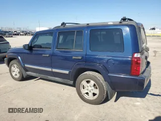 2006 Jeep Commander with VIN 1J8HH48K06C179567, listed as a Copart auction lot 88556105 with 196,696 mi miles and Salvage title. Bid and sale history available at DreamBid. Image 2.