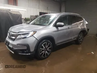 2021 Honda Pilot Elite with VIN 5FNYF6H04MB053008, listed as a Copart auction lot 87802955 with 70,737 mi miles and Salvage Title. Bid and sale history available at carsss.com. Image 1.
