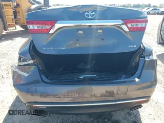 2018 Toyota Avalon XLE with VIN 4T1BK1EB1JU285770, listed as a IAAI auction lot 42073553 with 71,809 mi miles and . Bid and sale history available at DreamBid. Image 6.