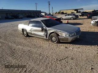 2000 Cadillac Eldorado Touring with VIN 1G6ET1295YU145248, listed as a Copart auction lot 82160574 with 87,294 mi miles and Salvage Title. Bid and sale history available at DreamBid. Image 11.