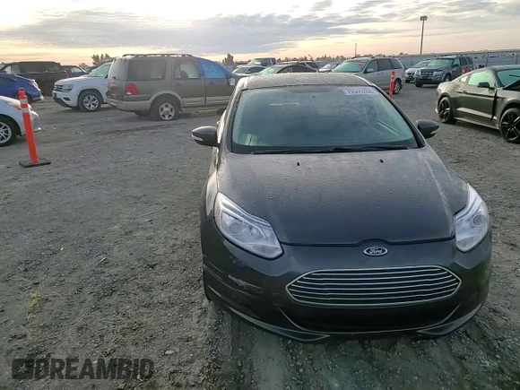 2015 Ford Focus Electric with VIN 1FADP3R43FL221870, listed as a Copart auction lot 79549284 with 67,079 mi miles and Salvage title. Bid and sale history available at DreamBid. Image 10.